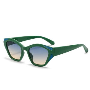 Green cat eye sunglasses with blue-yellow gradient lenses and blue textured frames