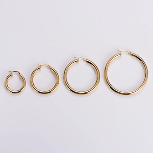 Polished 18k gold plated stainless steel hollow hoop earrings set in four various sizes