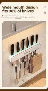 Detail of wall-mounted kitchen knife rack showing multi-functional slots and hooks