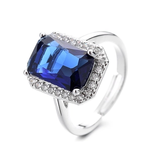 Vintage rectangular deep blue gemstone open ring with white diamond halo on silver