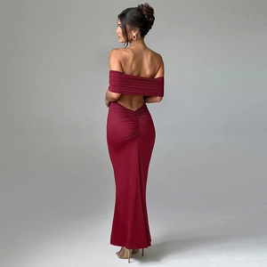 Detail view of the backless design on this slim fit wine red off-shoulder maxi dress
