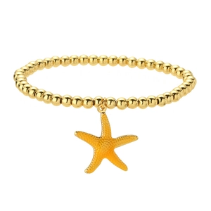 Fashionable gold beaded bracelet featuring a realistic starfish charm for beach styling