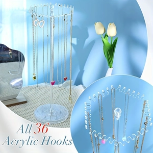 Clear acrylic rotating necklace organizer with 36 hooks for jewelry storage and display