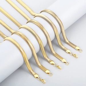 Three-piece set of golden flat snake bone chains with high-gloss metallic finish