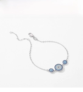 Close-up of S925 sterling silver Evil Eye bracelet with blue and white zircon stones