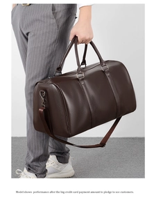 Model holding a dark brown PU leather travel bag with lychee texture and shoe compartment