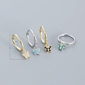 Macro detail of S925 silver butterfly drop earrings showing 17mm size and gemstone colors