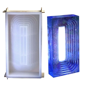 Concentric rectangle silicone mold for resin night light with blue glitter finished piece
