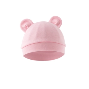 Soft pink cotton baby beanie with cute bear ears on a clean white background