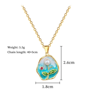 Detailed view of enamel garden pendant with pearls and dimensions 2.6x1.8cm on a gold chain