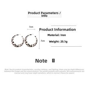 Detailed view of large leopard print hoop earrings with 7cm diameter and iron material specs