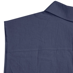 Detailed view of dark blue linen texture and lapel collar on men's sleeveless shirt