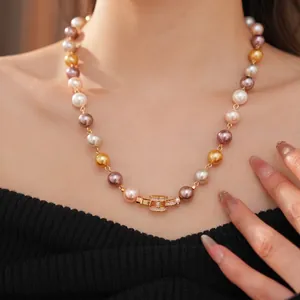 Elegant multi-colored pearl necklace featuring a zircon-encrusted H-shaped golden buckle