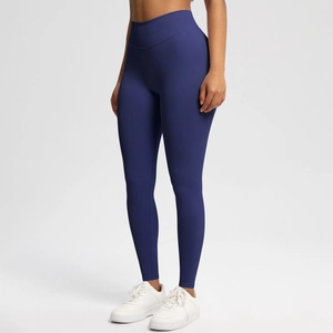 Detailed texture of seamless high-waisted navy blue yoga pants with peach-butt lifting effect
