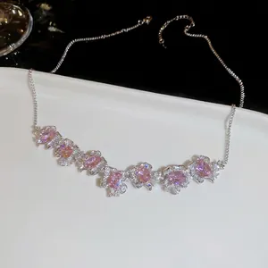 Luxury square zircon flower pendant necklace with pink stones and silver chain on tray