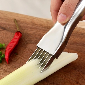 Golden stainless steel green onion shredder with multi-blade design on wooden board