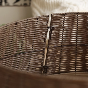 Handwoven dark brown Christmas tree collar base with durable metal hinges and rustic texture