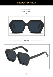 Detailed front and side views of black geometric hexagonal sunglasses with dark grey lenses