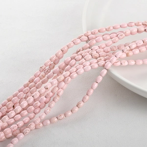 Pink synthetic turquoise oval beads with marble texture for DIY jewelry making and crafts