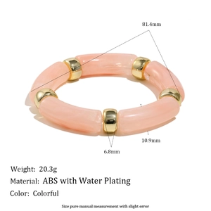 Pink marble acrylic stretch bracelet with gold plated spacers for casual resort style