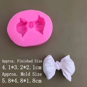 Moule en silicone rose en forme de nœud pour fondant avec mesures pour décoration gâteau