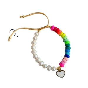 Bohemian pearl bracelet with rainbow polymer clay beads and heart enamel charm