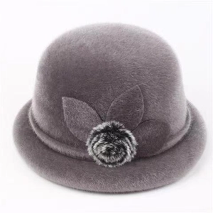Elegant dark grey winter cloche hat with felt leaves and stylish faux fur pompom detail