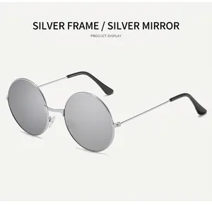 Seitenansicht der runden Retro-Sonnenbrille mit silbernem Metallrahmen und verspiegelten Gläsern