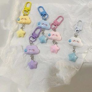 Set of 5 colorful star and cloud keychains in yellow blue purple pink and white