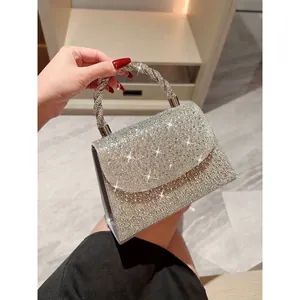 Sparkling silver rhinestone evening handbag with metallic twisted handle for women