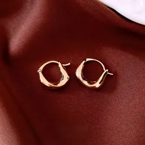 18K gold plated oval pleated hoop earrings for women with irregular geometric twisted design