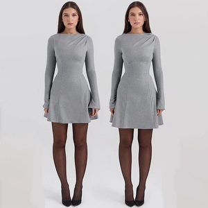 Detail view of a slim-fit long-sleeve grey knit dress with square neckline and A-line skirt