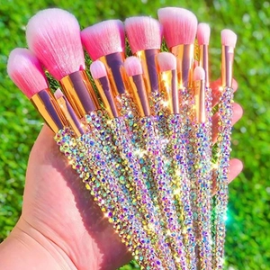 Detail of 12-piece sparkling rhinestone makeup brush set with pink gradient bristles