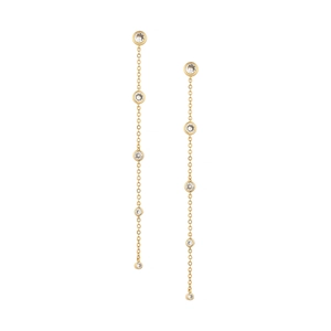Detail of gold long tassel earrings featuring six sparkling bezel-set crystals