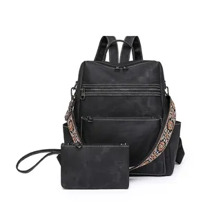 Black vintage leather backpack set with floral embroidery strap and white contrast stitching