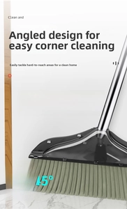 Detail of 45-degree angled broom with 30cm wide head and 7cm bristles on marble floor