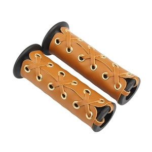 Brown leather motorcycle handlebar grips with vintage cross-stitch lace design detail