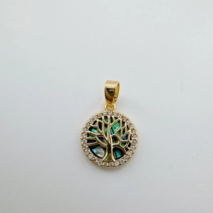 Detailed view of 18k gold plated Tree of Life pendant with abalone shell and zircon stones