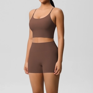 Macro shot of seamless high-waist yoga shorts and brushed sports top in dark chocolate