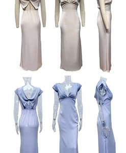 Detail of elegant backless dress featuring a twist knot detail and a sleek v-neck design