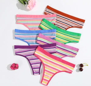 Set of seven colorful ribbed cotton thongs for women with soft breathable texture