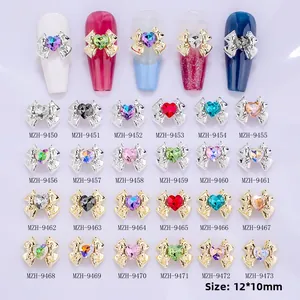 Detail showing 24 colors of 12x10mm alloy bow nail charms with colorful heart rhinestones
