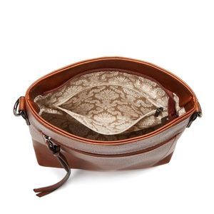 Top view of brown faux leather tote showing vintage patterned lining and interior zipper pocket