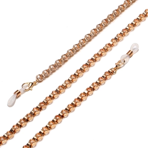 Detail of gold metal glasses chain with lobster clasps and non-slip silicone loops
