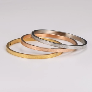 Set di 3 bracciali rigidi 4mm in acciaio inox con motivi a onde in oro, argento e oro rosa