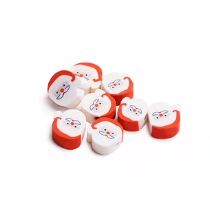 Close-up of Santa Claus polymer clay beads for DIY Christmas jewelry making