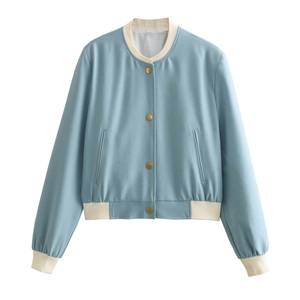 Detail of light blue bomber jacket featuring cream ribbed collar and gold snap buttons