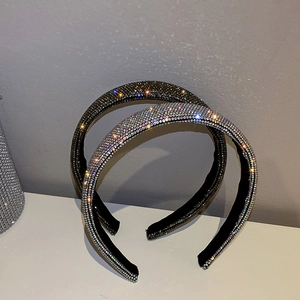 Sparkling rhinestone padded headband for women in black and silver finishes