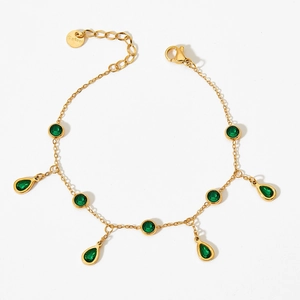 Chevillère élégante en acier inoxydable doré avec pendentifs en zircon vert sur blanc
