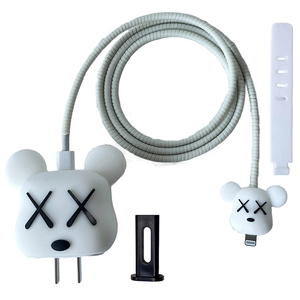 Close-up of white 5-piece charger protection set with cable protector and cord tie